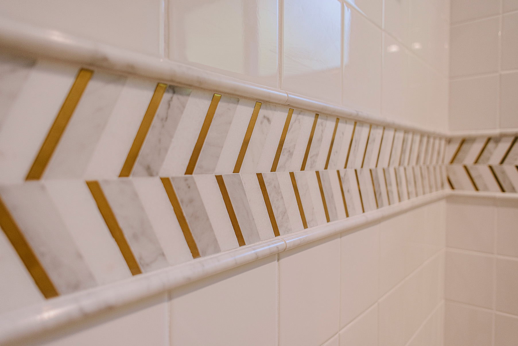 Close up white and gold custom tile